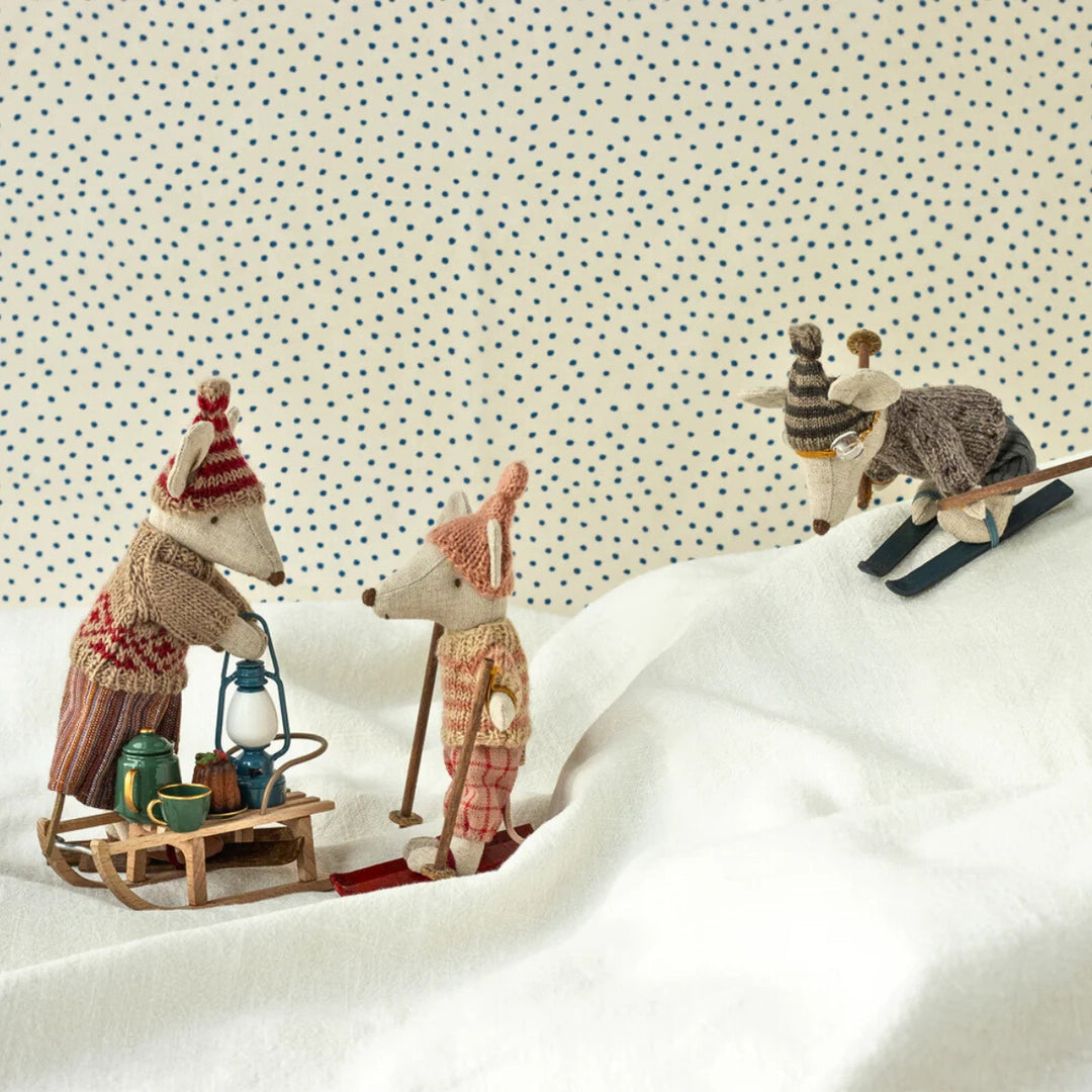 Maileg Mice having Christmas tea party with tea set on sleigh