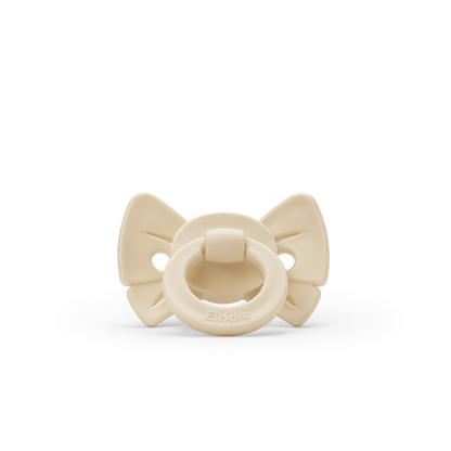 Binky Bow Orthodontic Silicone  3+ months - Oat White